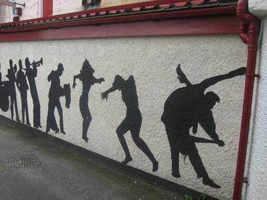 External Mural painted on rough surface Mural painted on external awall image